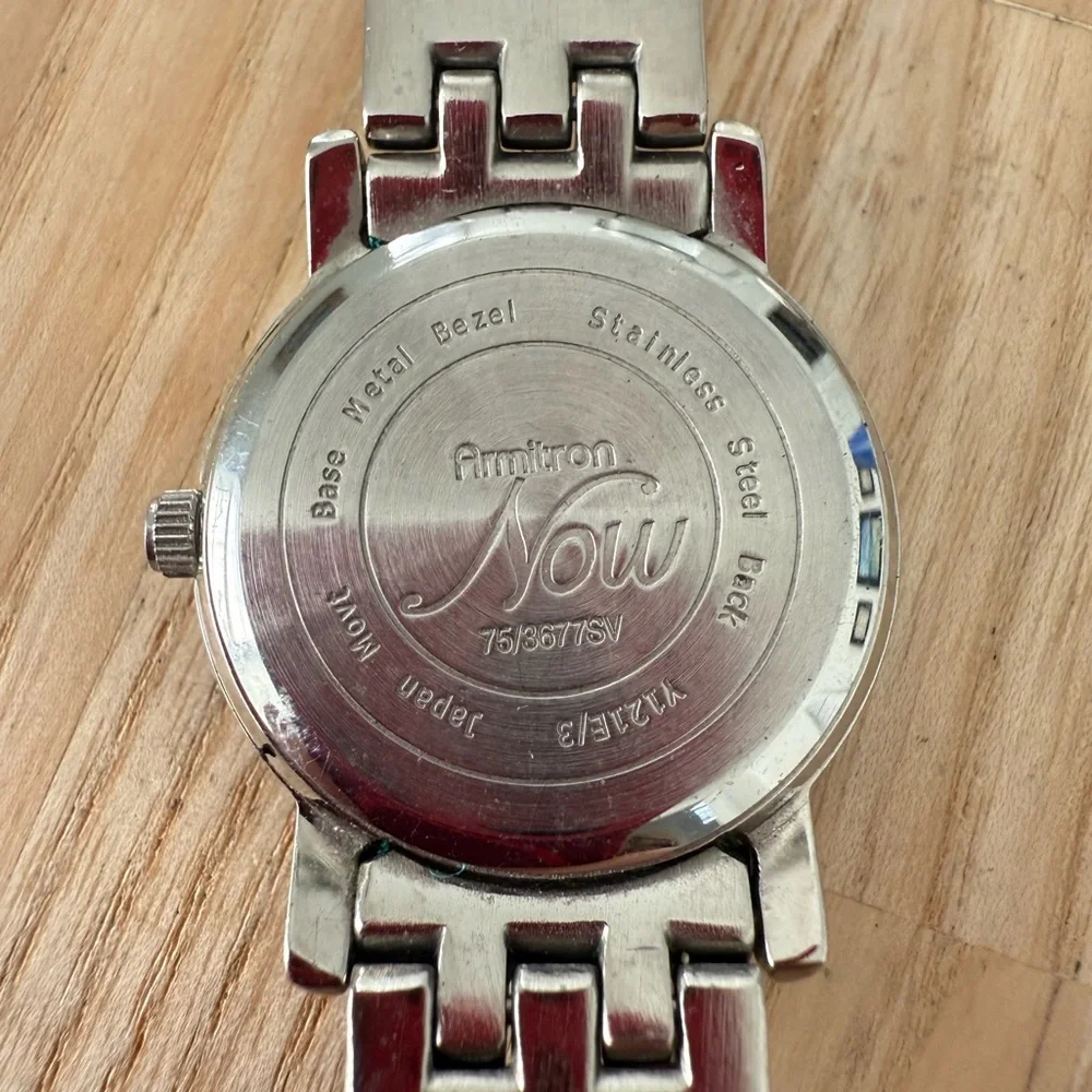 Armitron Now ladies butterfly silver tone watch NEW BATTERY